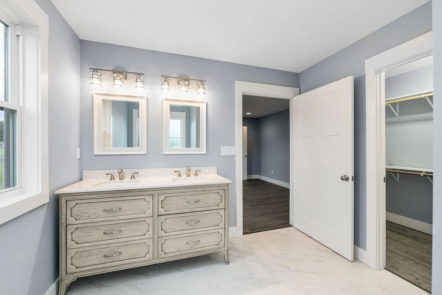 Luxury bathroom with dual vanity and marble